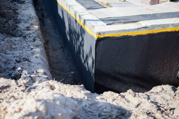 Professional Waterproofing technician working in Kaukauna, WI